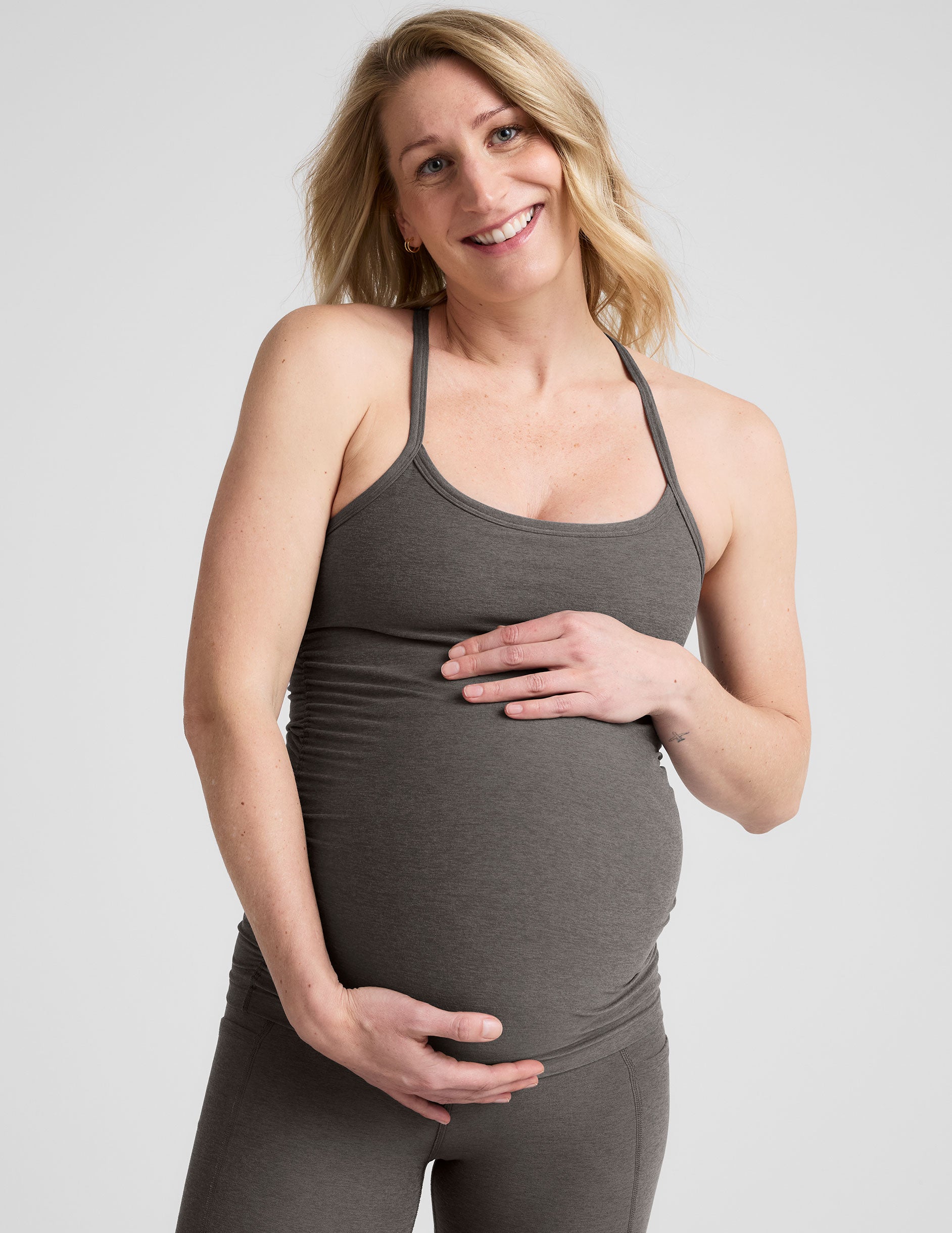 grey racerback maternity tank with slim straps.