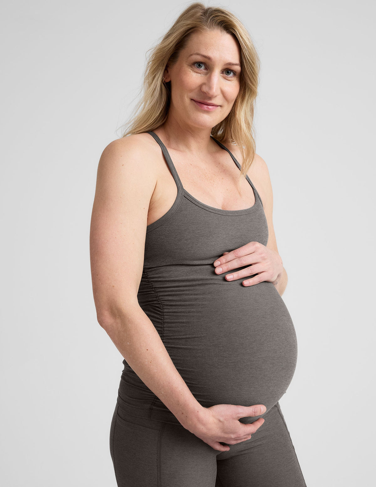 grey racerback maternity tank with slim straps.