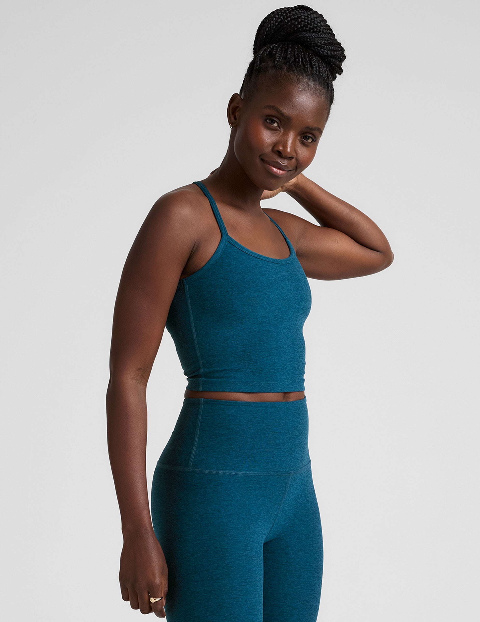 blue racerback cropped tank top with slim straps.