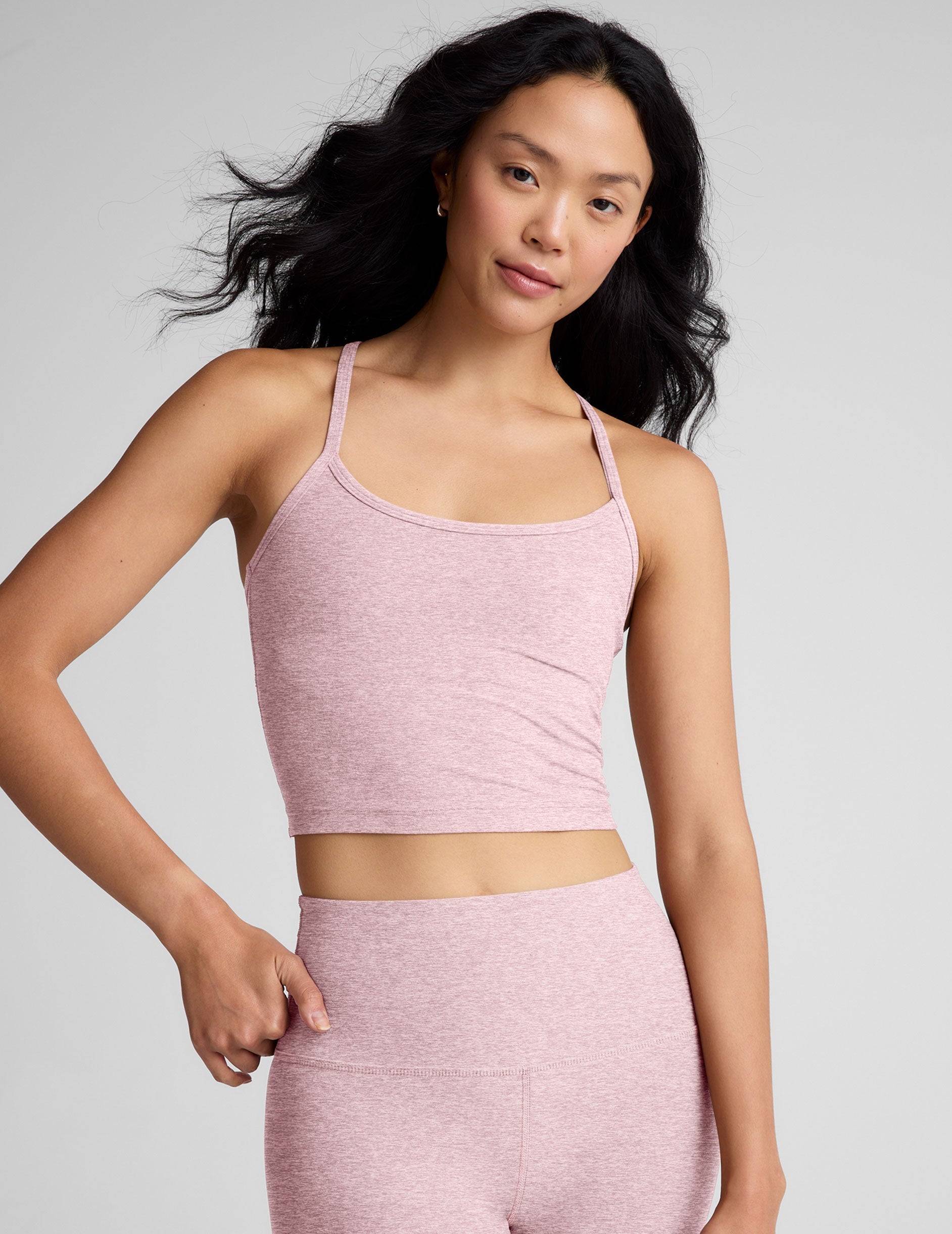 pink racerback cropped tank top with slim straps.