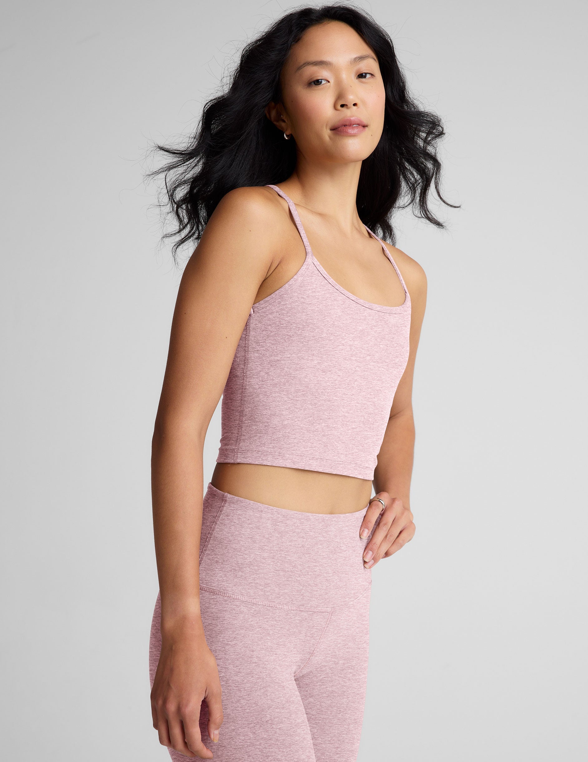 pink racerback cropped tank top with slim straps.