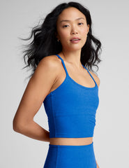 blue cropped length racerback cropped tank top with slim spaghetti straps.