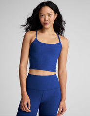 blue cropped tank top with slim spaghetti straps.
