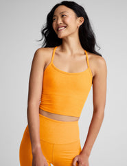 orange racerback cropped tank top with spaghetti straps.