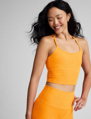 orange racerback cropped tank top with spaghetti straps.