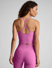 pink racerback cropped tank with slim straps.