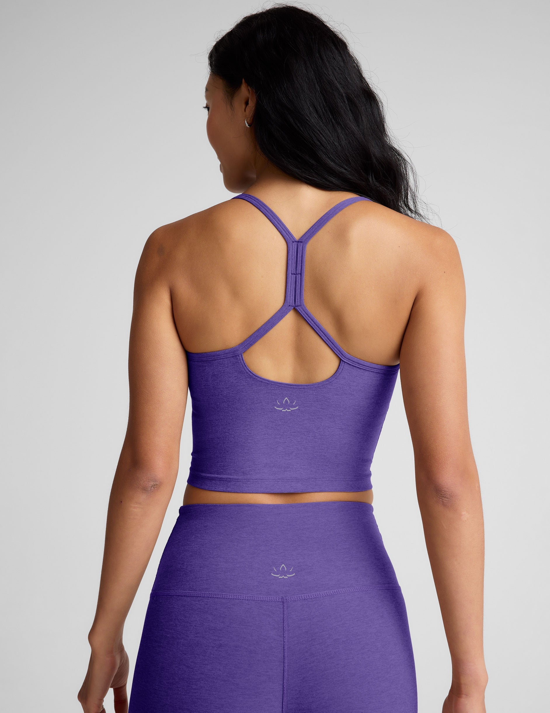 purple racerback cropped tank top with slim straps.