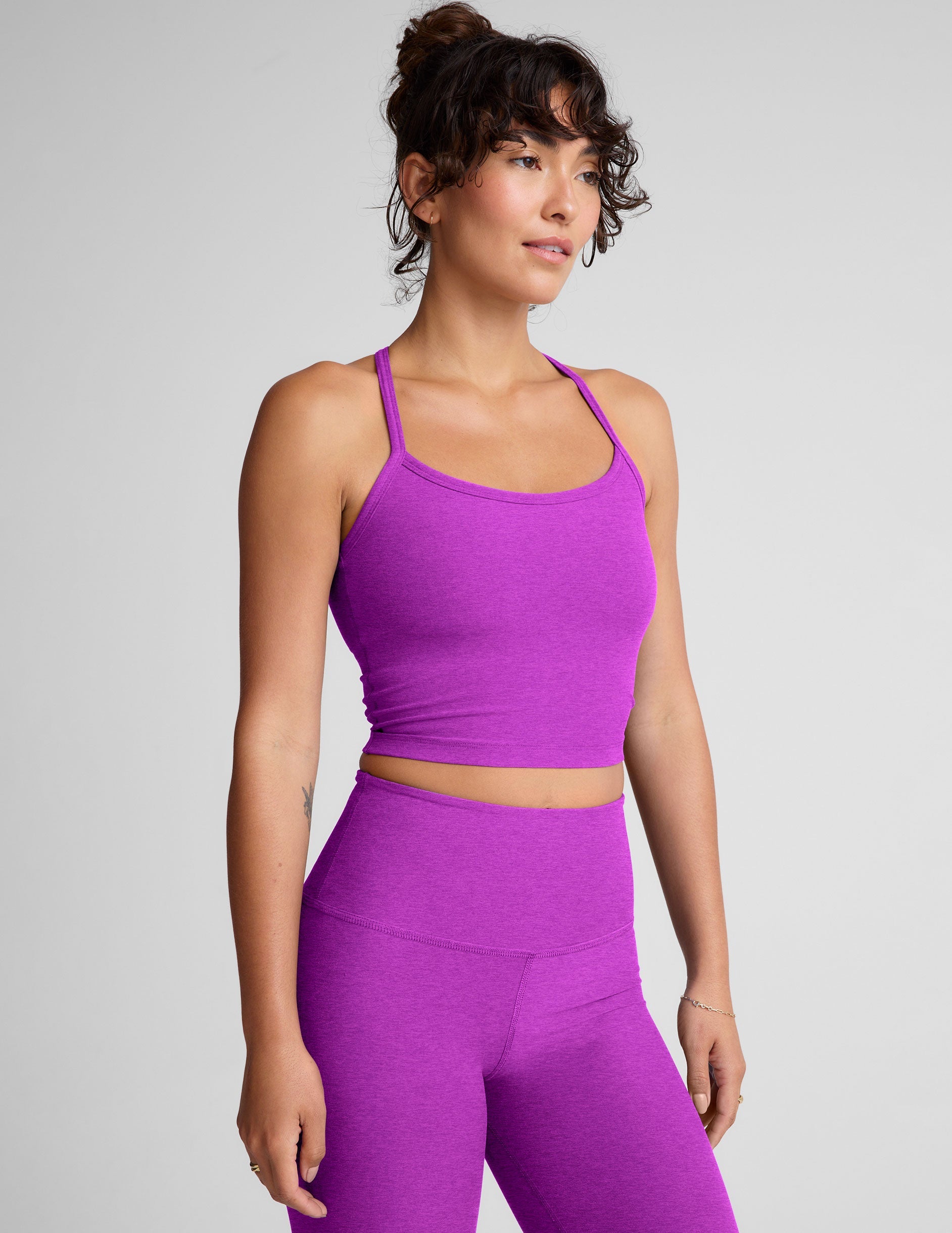 purple racerback cropped tank with slim straps.