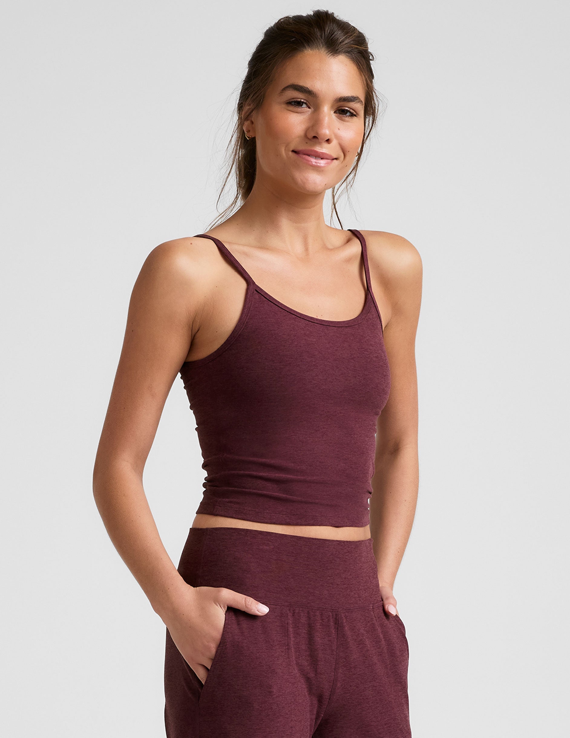 red waist length spaghetti strap tank.