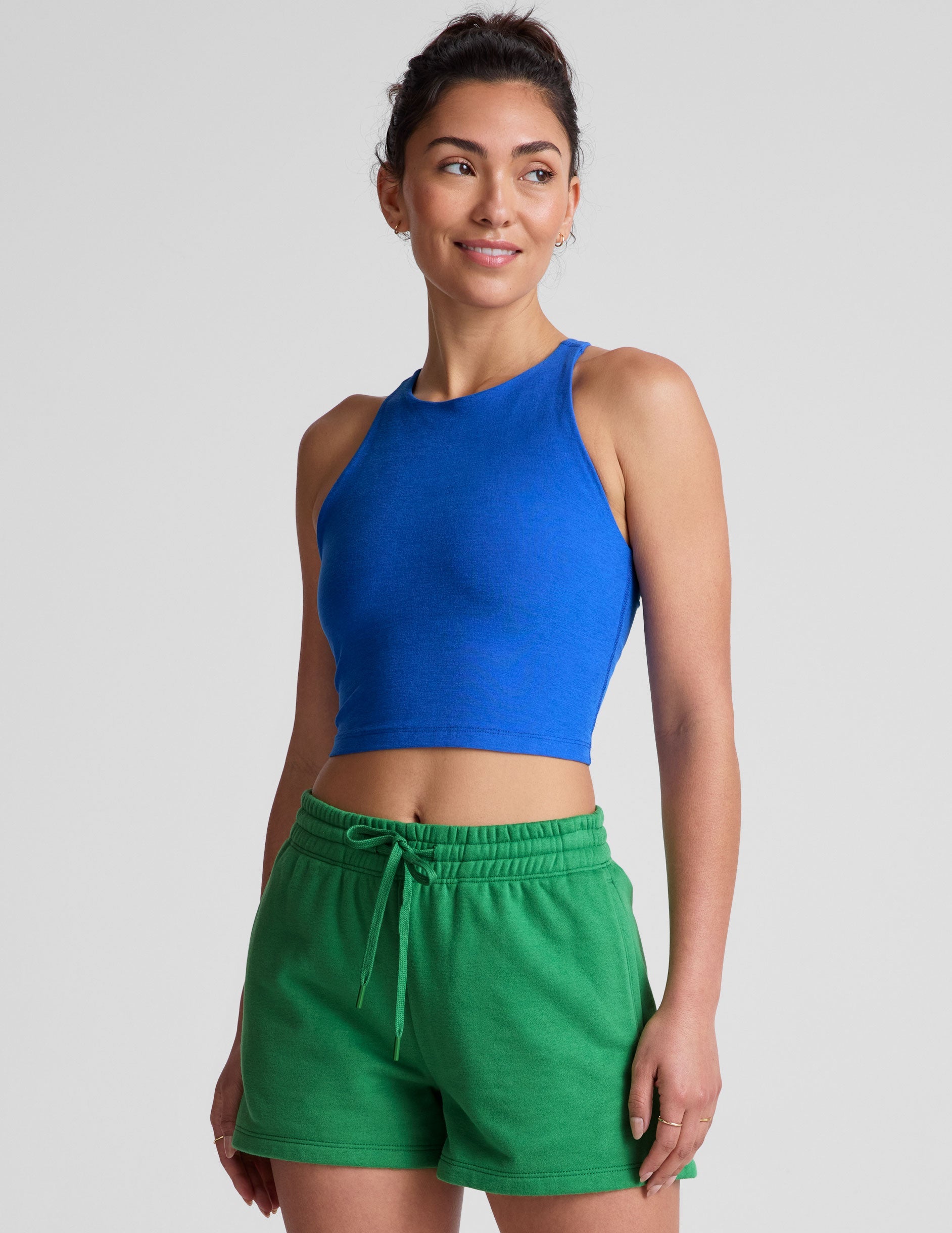 blue high-neck racerback cropped length tank top.