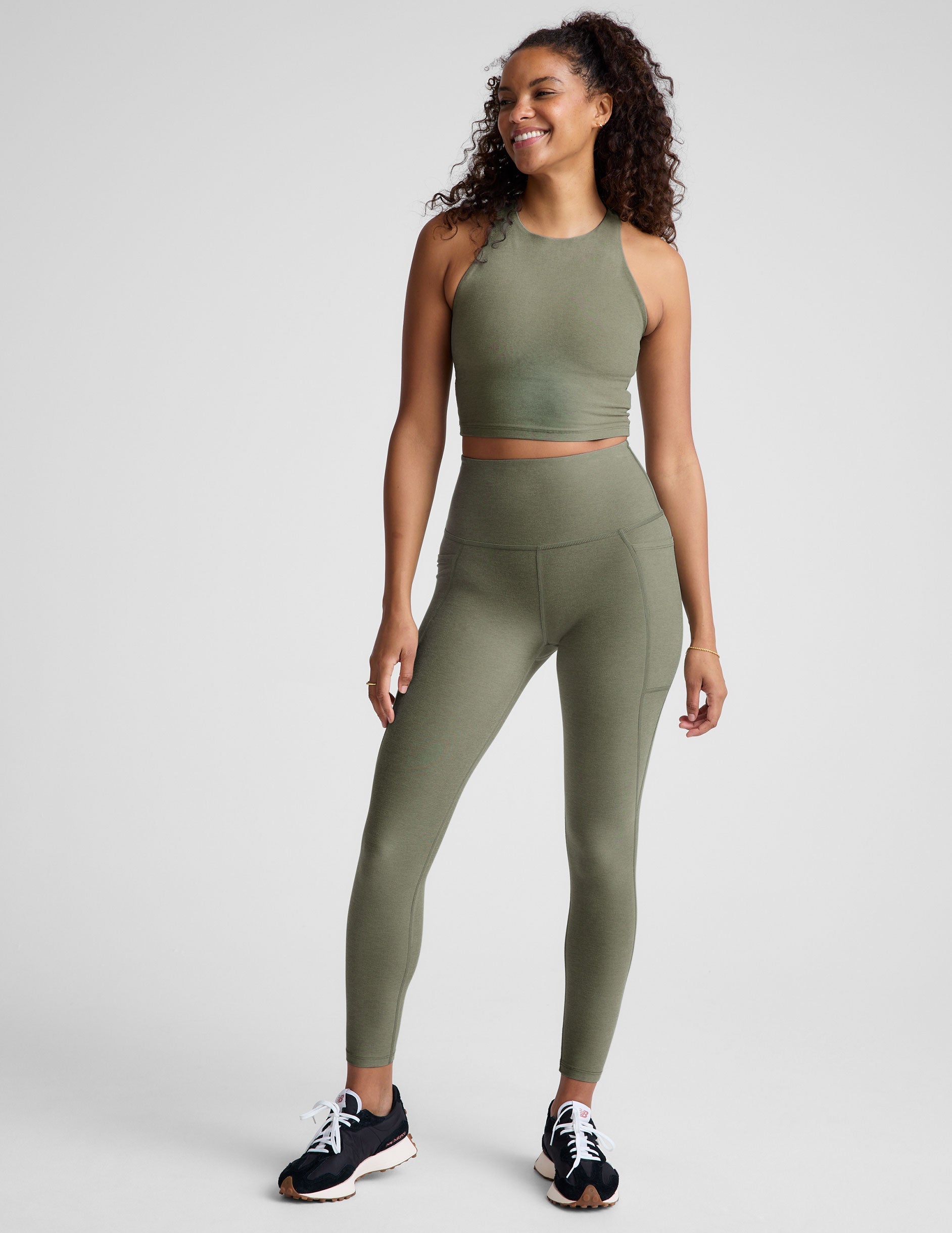 green racerback cropped tank with a high scoop neckline.