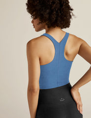 blue high-neck racerback cropped tank.
