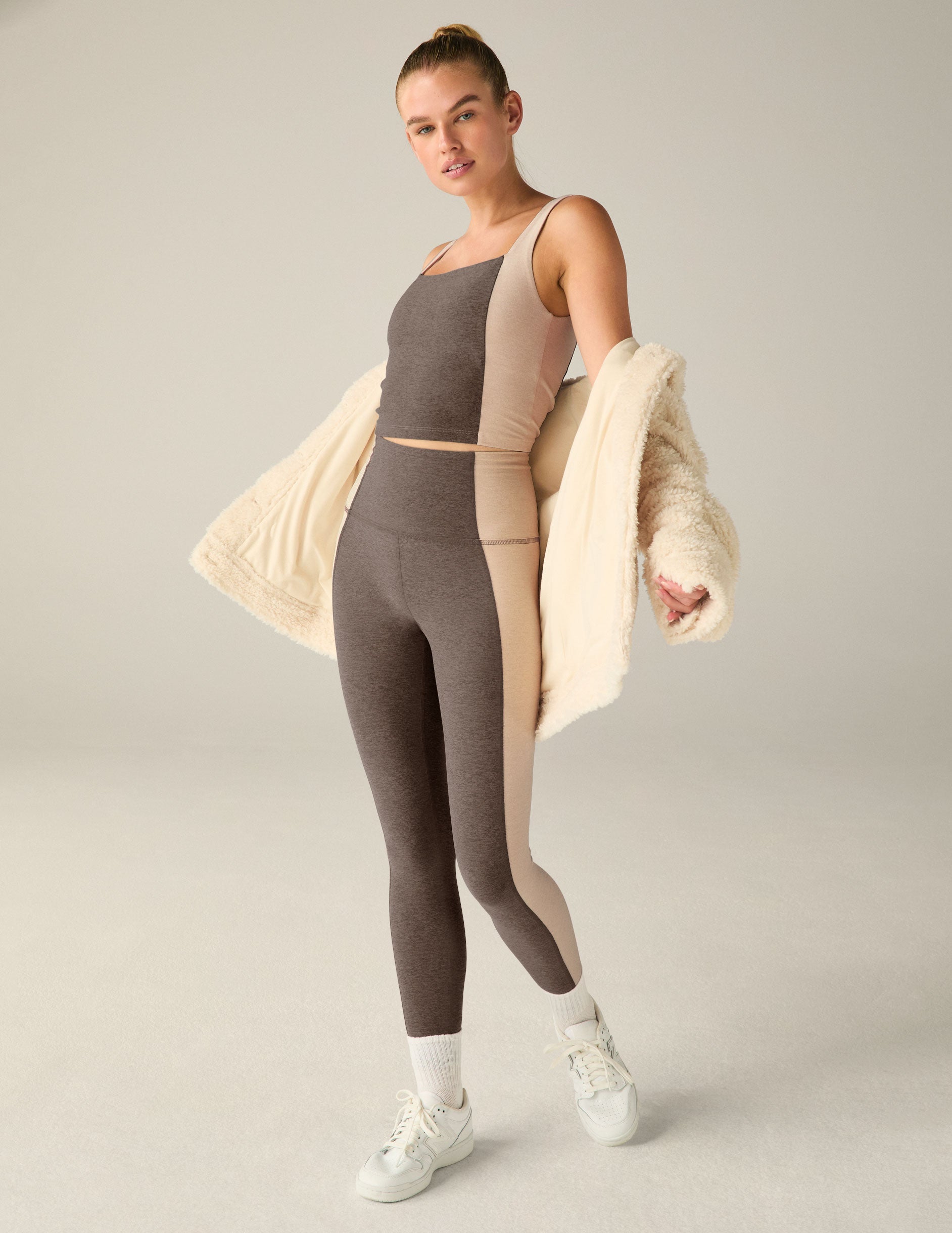 brown square neck cropped tank top with white lining on the sides.