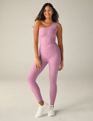 pink one-shoulder cropped tank top.