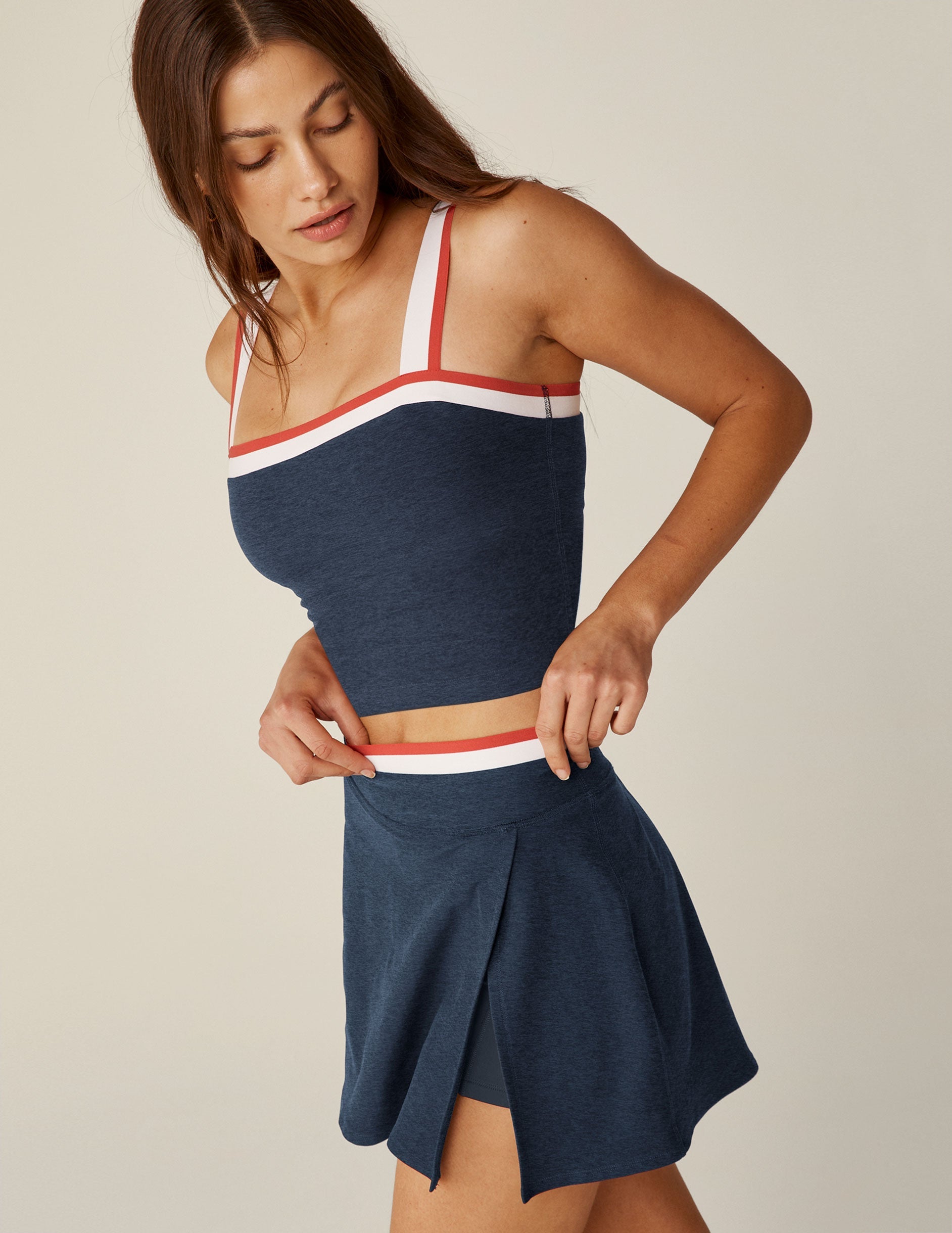 blue square neck cropped tank top with white and red stripes and outlining around the neckline.