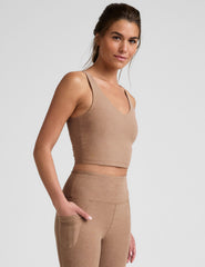 tan cropped tank top with a front and back v neckline.