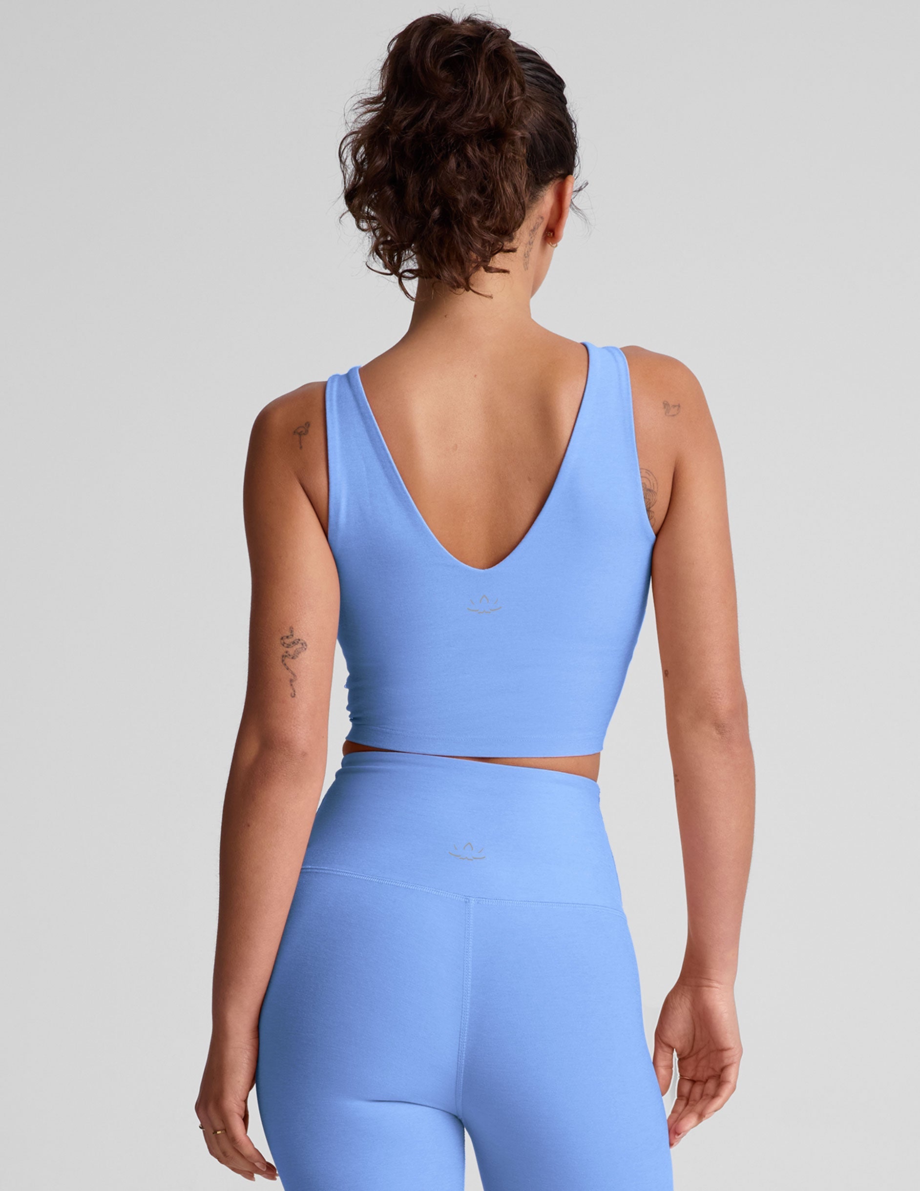 blue v-neck cropped tank top.