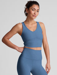 blue cropped tank with a soft front and back v neckline.