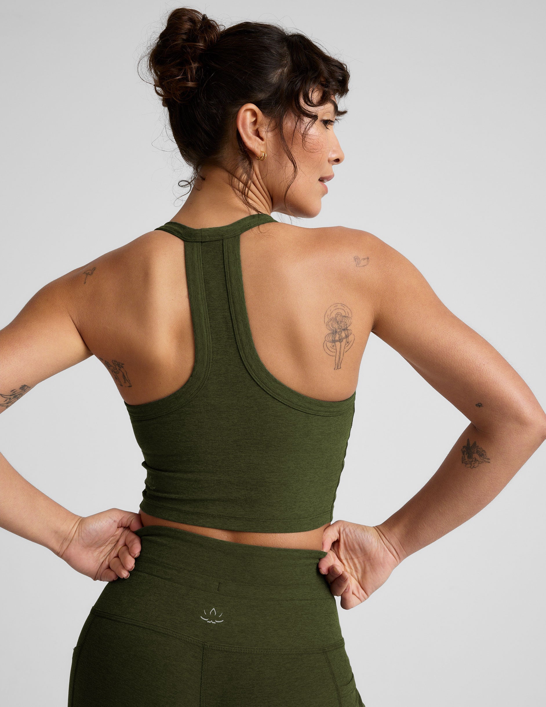 green v-neck cropped tank with a high racerback.