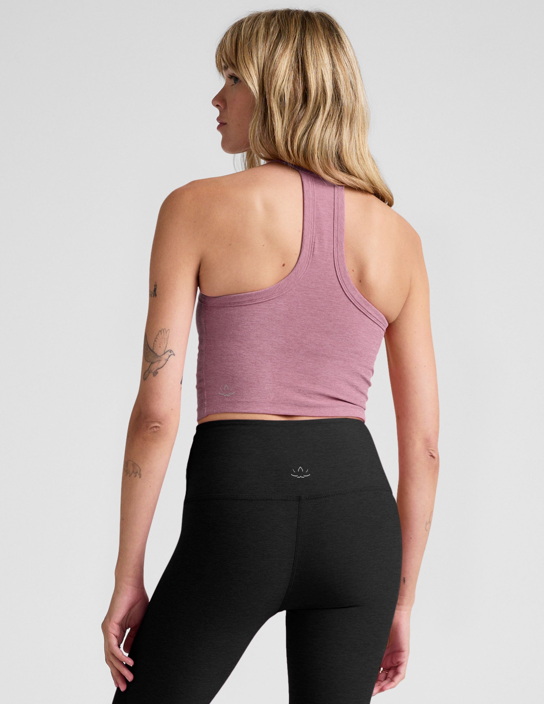 pink v-neck cropped tank top with a high racerback.