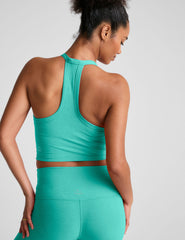 blue v-neck cropped tank top with a wide racerback detail.