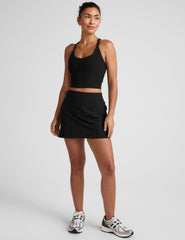 black cropped tank with a v-neckline and high racerback.