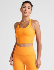 orange v-neck cropped tank with a high racerback.