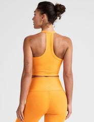 orange v-neck cropped tank with a high racerback.