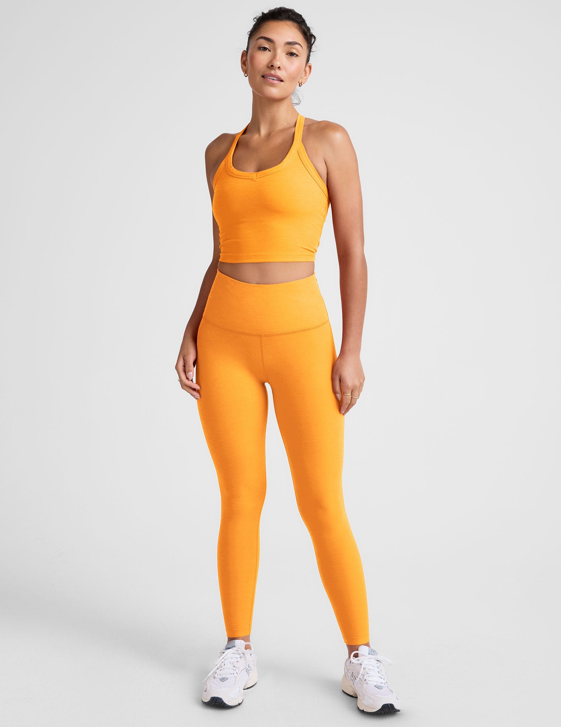 orange v-neck cropped tank with a high racerback.