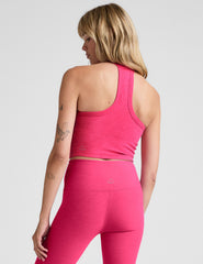 pink cropped tank top with a v-neckline and high racerback.