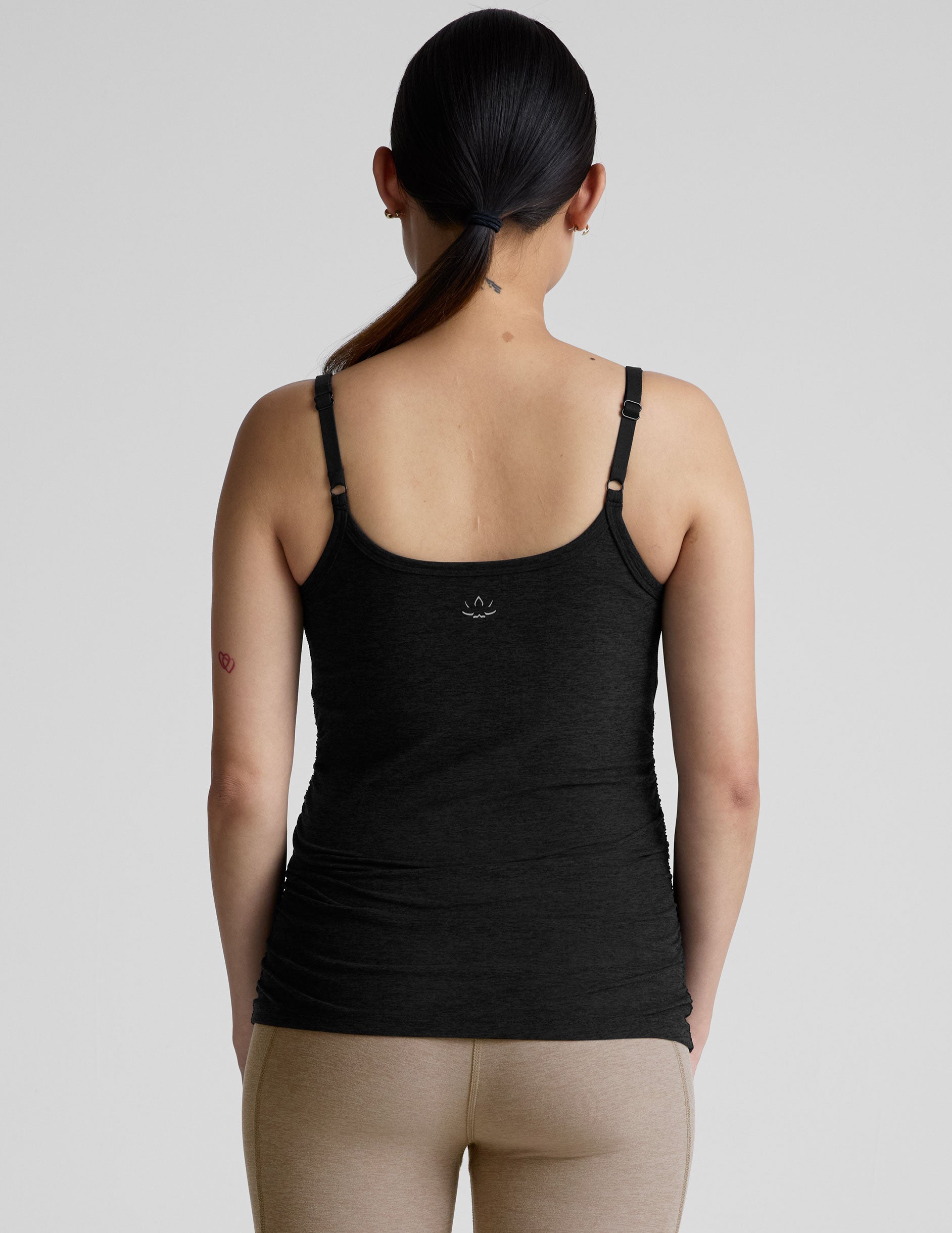 black nursing tank with adjustable straps.