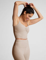 brown cropped tank with shirred detailing at center front, sweetheart neckline, and adjustable straps. 