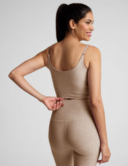 brown cropped tank with shirred detailing at center front, sweetheart neckline, and adjustable straps. 