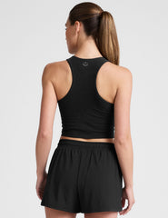 black cropped tank with a high neck with center front zipper.