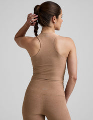 back image of a brown racerback cropped tank with a half zip up detail in front.