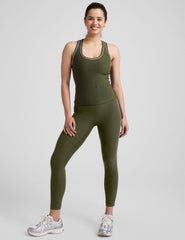 green midway length racerback tank with white contrast trim.