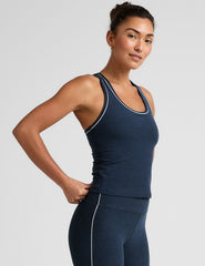 blue midway length racerback tank with white contrast trim.