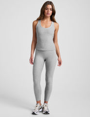 grey midway length racerback tank with white contrast trim.