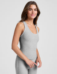 grey midway length racerback tank with white contrast trim.