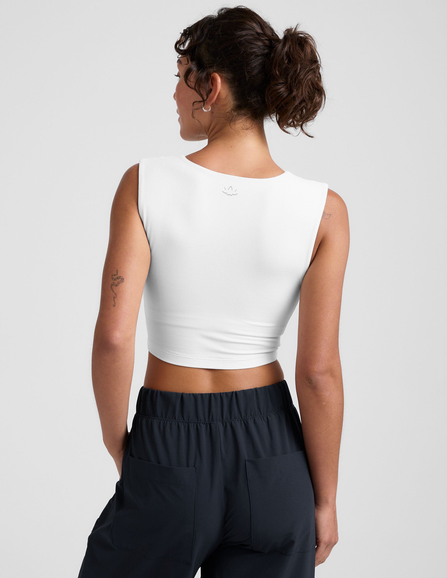 white square neck cropped tank with thick straps.