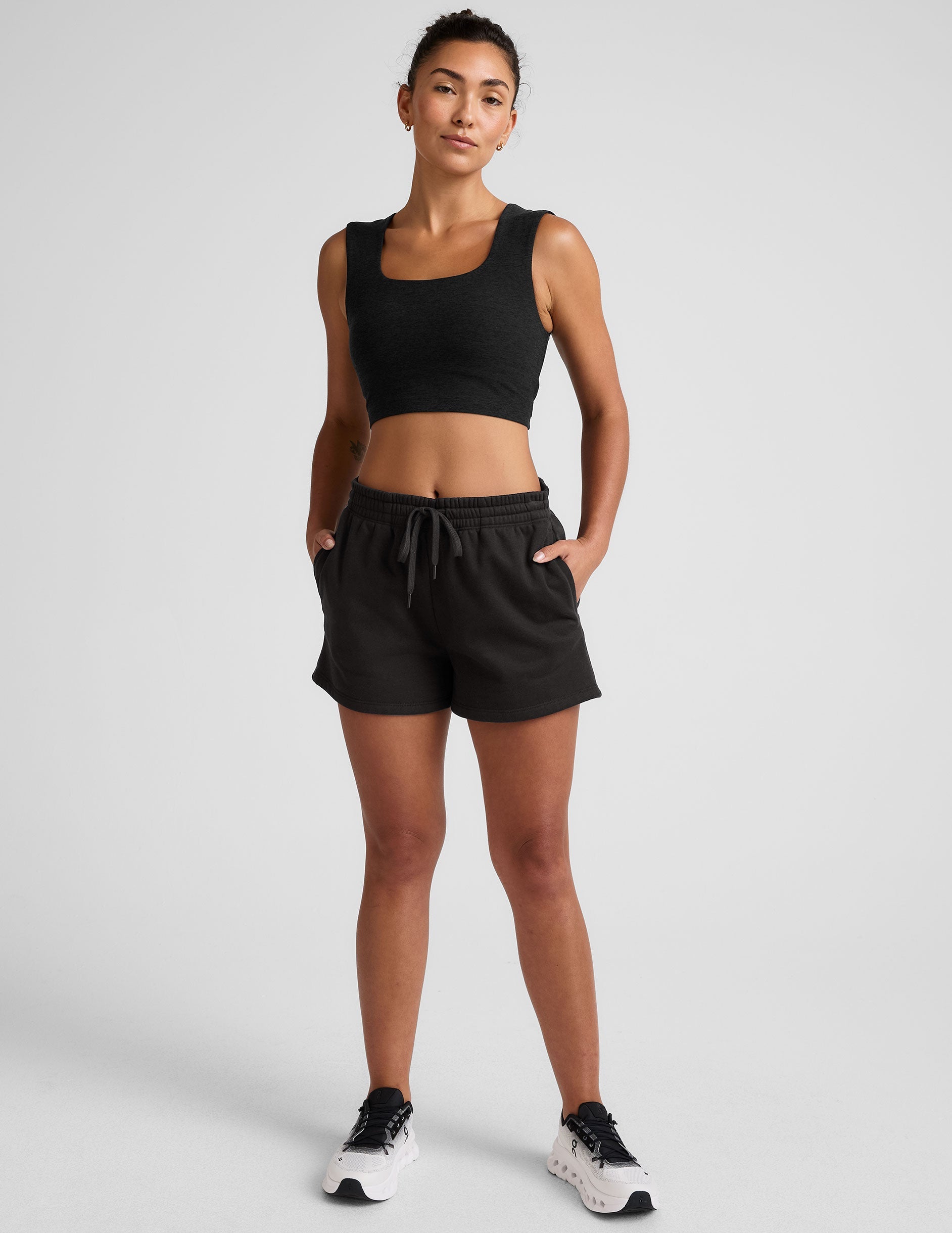 black square neck cropped tank with thick straps.