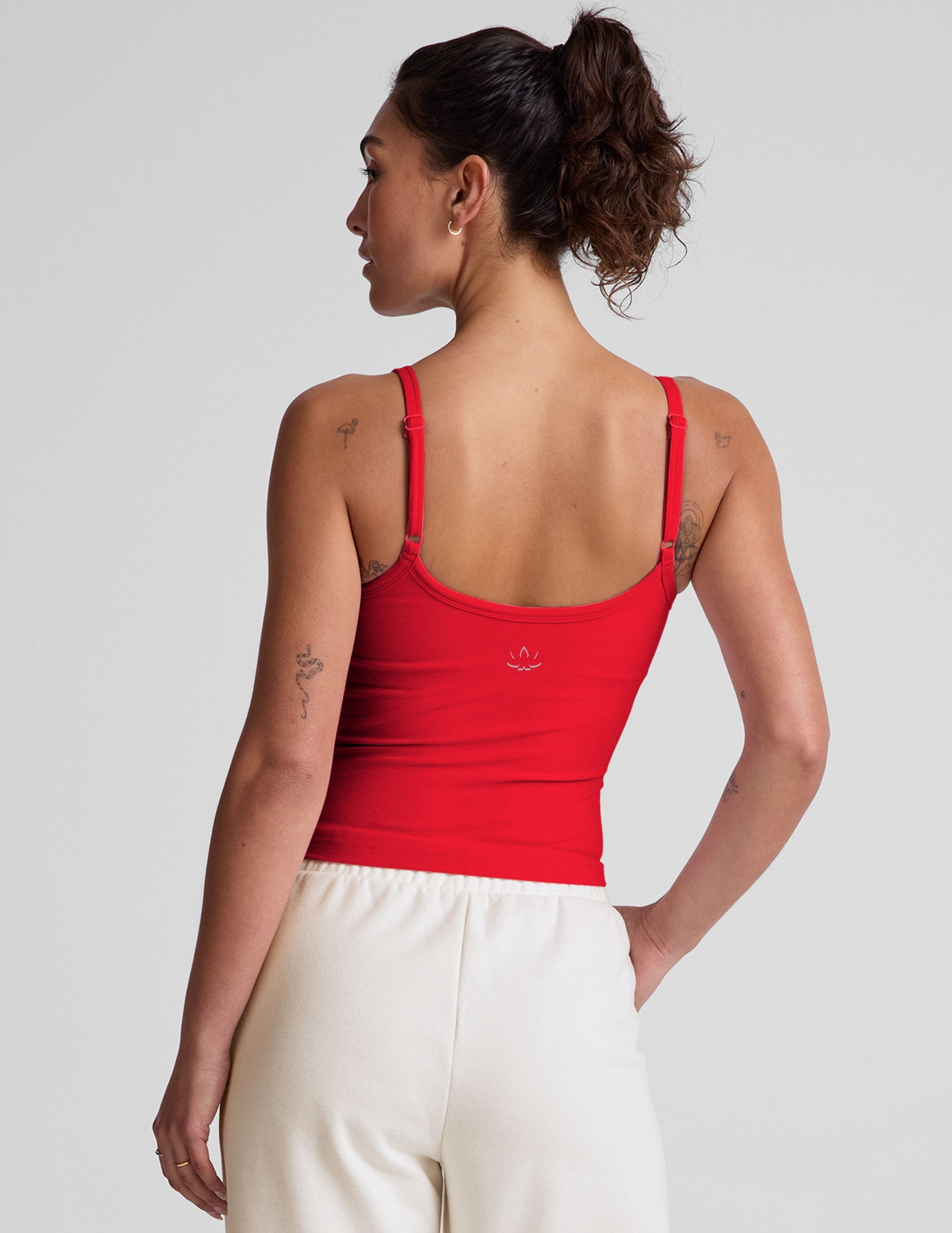 red waist length slim strapped racerback tank.