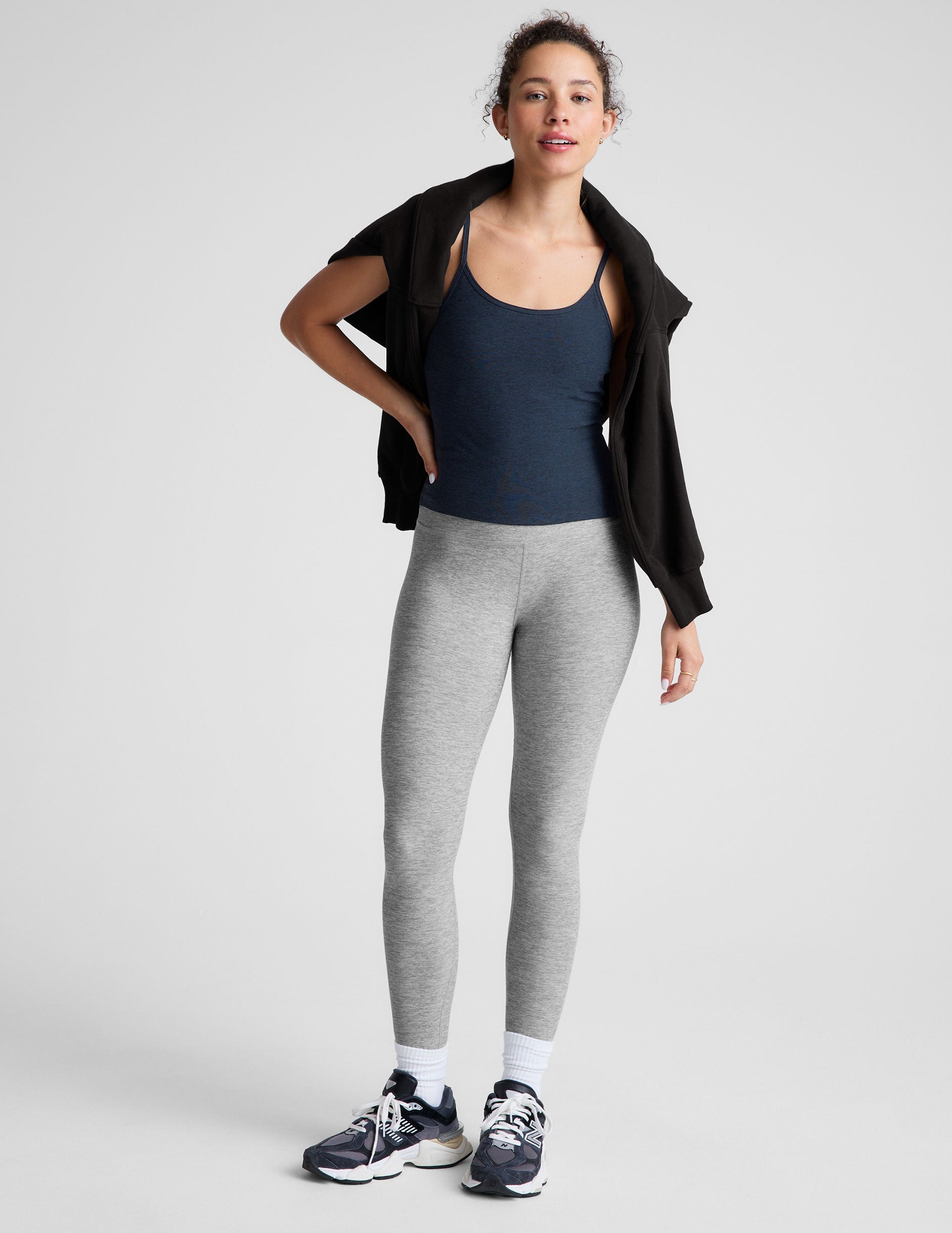 blue midway length tank with adjustable spaghetti straps.