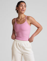 pink waist length tank with adjustable spaghetti straps.