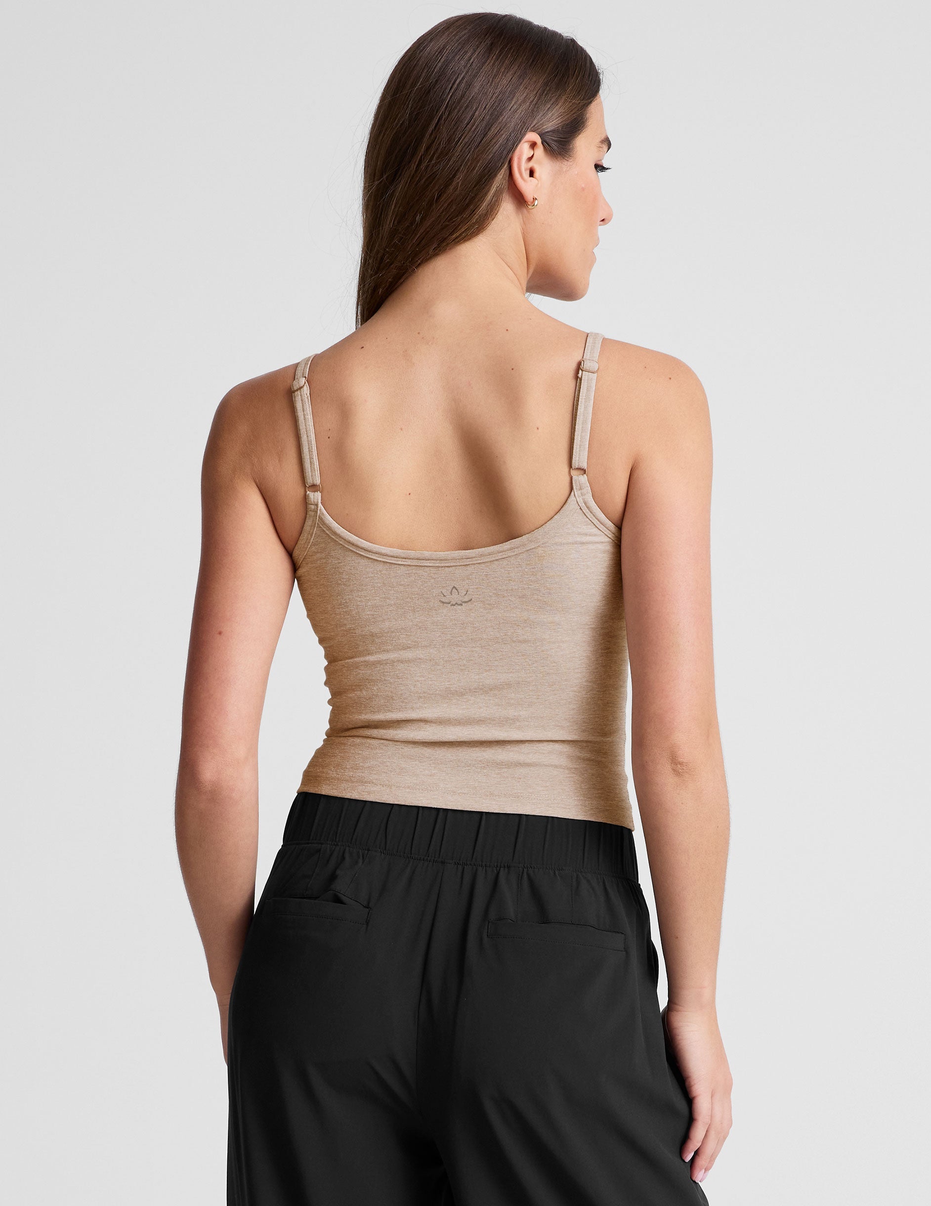 brown waist length tank top with adjustable straps.