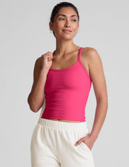pink waist length tank top with adjustable straps.