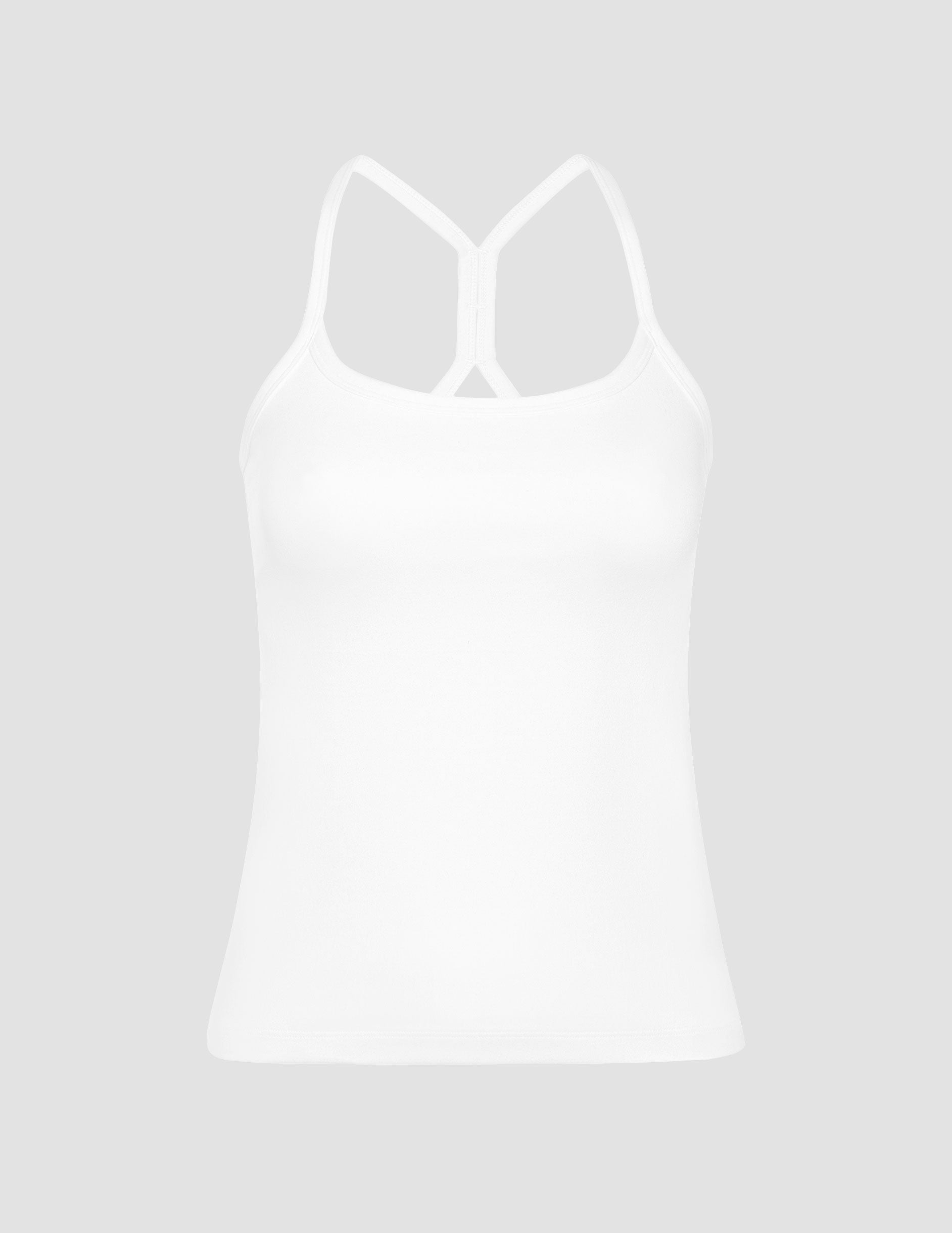 white midway length tank with adjustable spaghetti straps.
