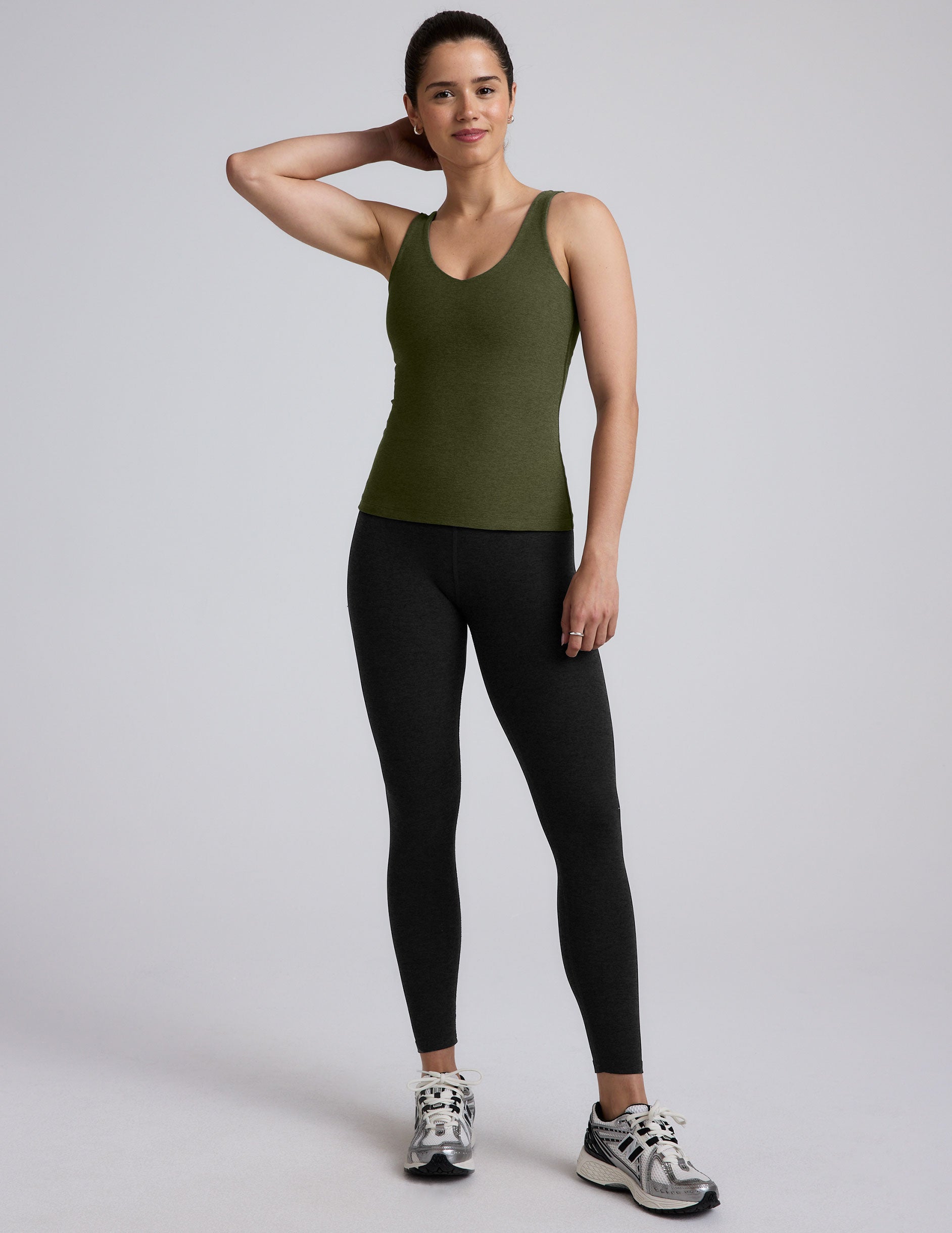 green long length tank top with a front and back v neckline.