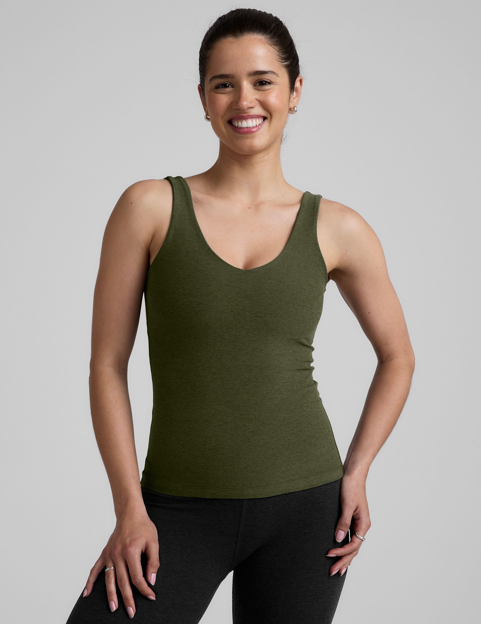 green long length tank top with a front and back v neckline.