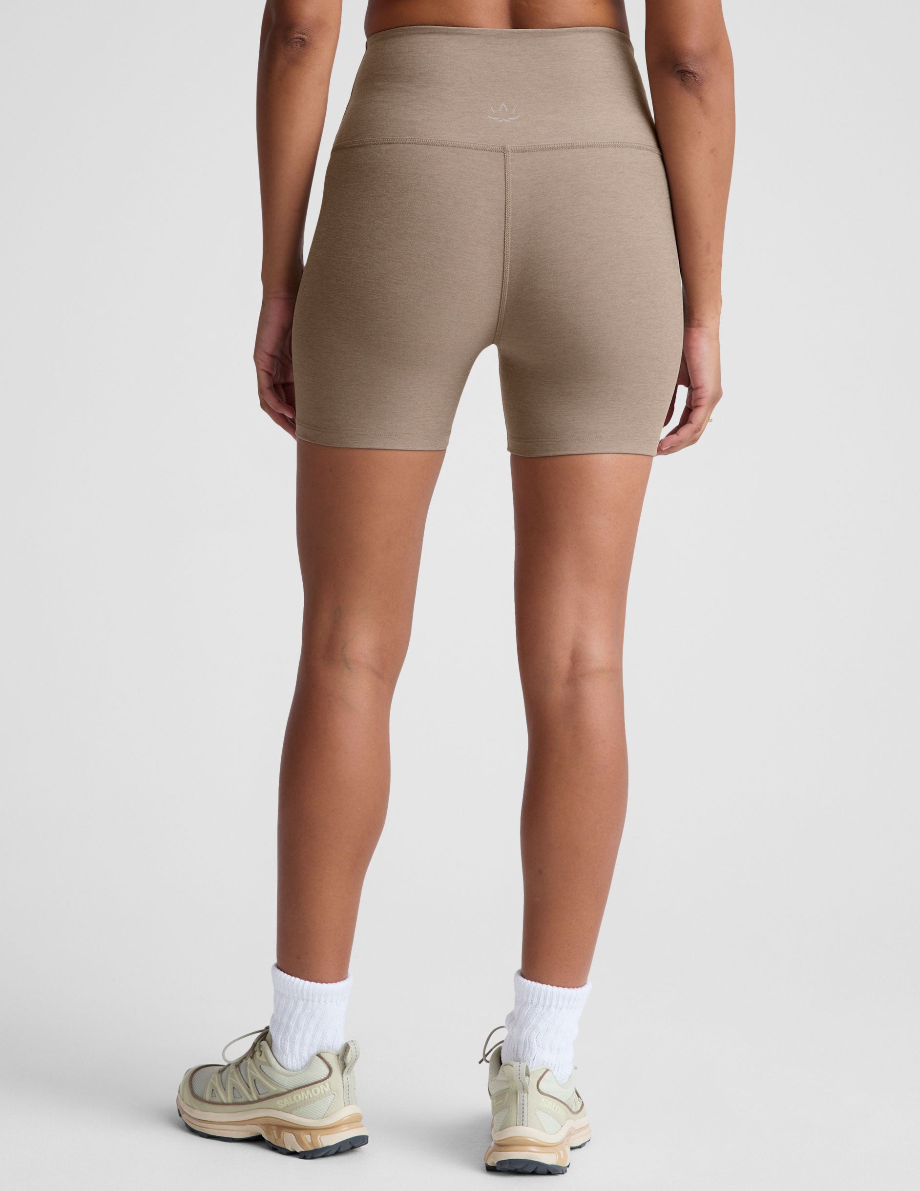 brown high-waisted 5" inseam biker shorts. 